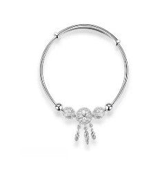 Elegant Bow Knot Bangle with Tassels and Hollow-Out Design